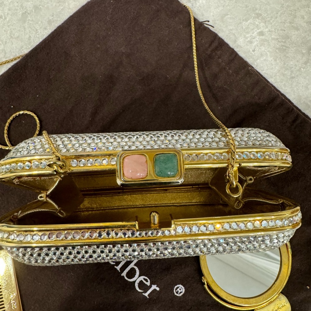 Judith Leiber cocktail bag with gold chain. Bag is in mint condition. Comb too